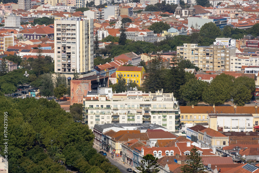 Fototapeta premium Panoramic view of setubal cityscape showing residential buildings and green areas in portugal