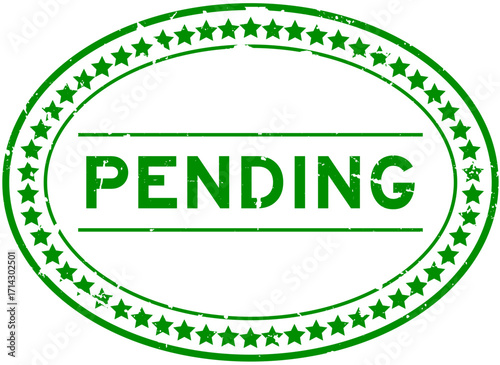 Grunge green pending word oval rubber seal stamp on white background