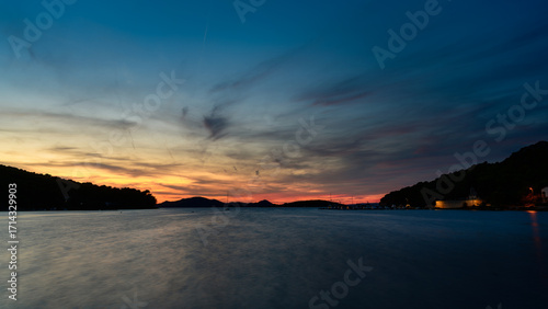 Dramatic sunset over the Adriatic Sea during blue hour
