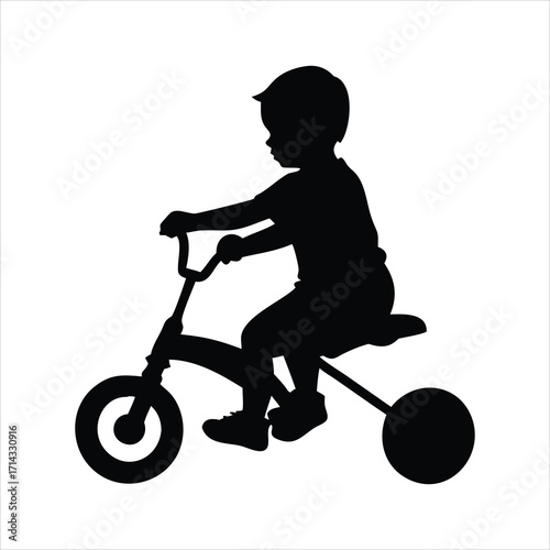 Silhouette of a young child riding a tricycle on a white background