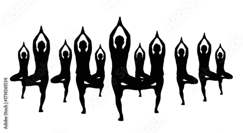 Diverse group of people practicing  yoga pose in silhouette