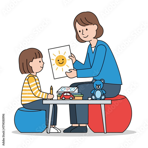 Female therapist conducting art therapy with a young child.