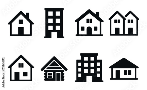 Real estate silhouette icon set. featuring house, apartment, cabin, and duplex symbols