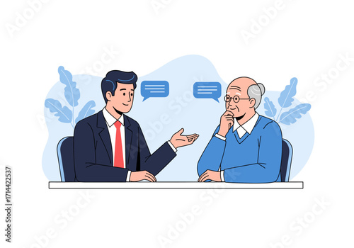 Two men in conversation at a table discussing business matters.