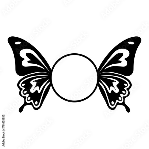 Butterfly wings with a central circle in black and white creating a symmetrical design element art