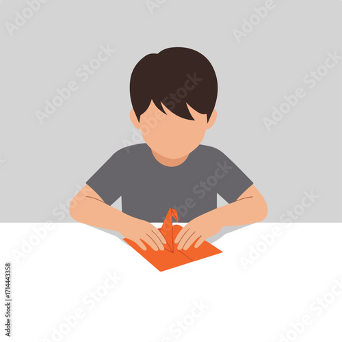 Animated boy folds orange origami paper on a table against a two-tone grey background