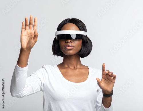 Woman wearing AR glasses interacting with AI virtual interface, modern lifestyle, bright studio