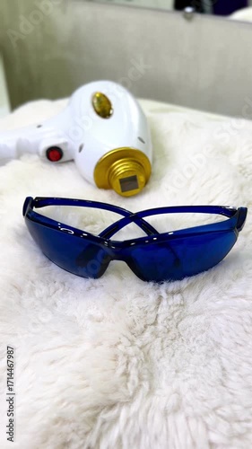 Laser hair removal machine and protective glasses