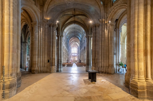Saint-Denis, France - 09 19 2025: Saint-Denis Cathedral Basilica. Panoramic view of the nave, the aisles and apse at the back from westwork