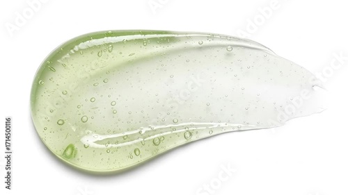 A vibrant, transparent smear of light green gel infused with numerous tiny air bubbles creates a fresh and clean aesthetic against a pristine white background. This fluid, viscous texture evokes feeli