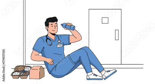 Tired male nurse or doctor in blue scrubs taking a well-deserved break, sitting on the hospital floor drinking water during a lunch