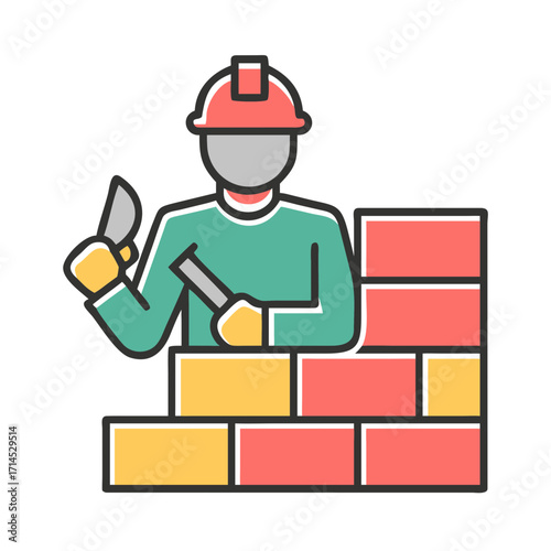 Construction worker using trowel to build wall with bricks  
