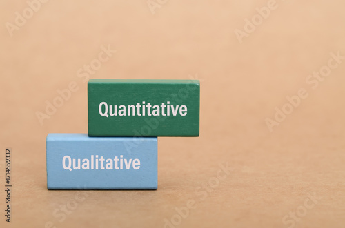 This conceptual image uses colored blocks to differentiate between quantitative (numerical) and qualitative (observational) approaches in research, business, and academic studies.