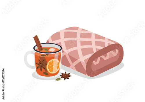 Spiced tea with citrus and cinnamon next to cozy blanket  
