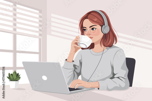 A happy businesswoman is working at her desk, talking on her cell phone, and smiling while using her laptop