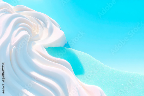A clean and stylized abstract image of white waves