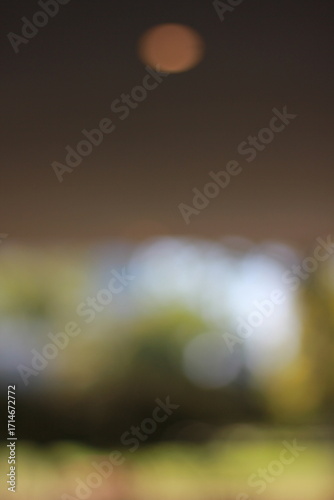 A vague soft focus view of a modern building with a window.