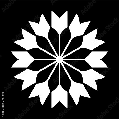 White decorative snowflake with ornate petals on black background, elegant winter symbol design for seasonal decoration projects