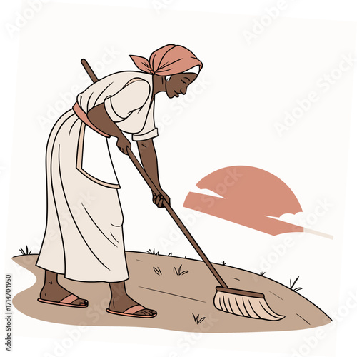 A woman wearing a headscarf and traditional clothing sweeps the ground with a broom outdoors