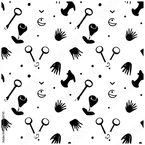 Whimsical black and white pattern of keys, roses, hands, moon phases, and abstract icons scattered