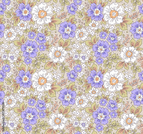 Beautiful floral pattern in small abstract flowers. Small white and lilac blue flowers. Light beige background. Liberty print. Floral seamless background. Vintage template for fashion prints. Stock
