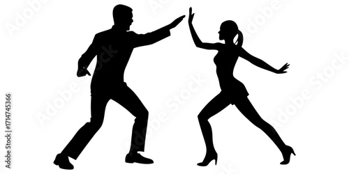 Silhouette of a man and woman dancing together in a lively pose