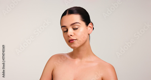 Photos Eyes closed, woman and beauty in studio for self care, wellness and glow on white background