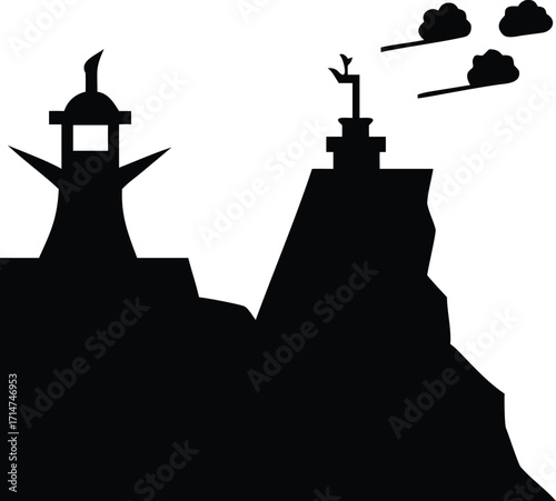 Silhouette of two lighthouses on a rocky cliff with smoke