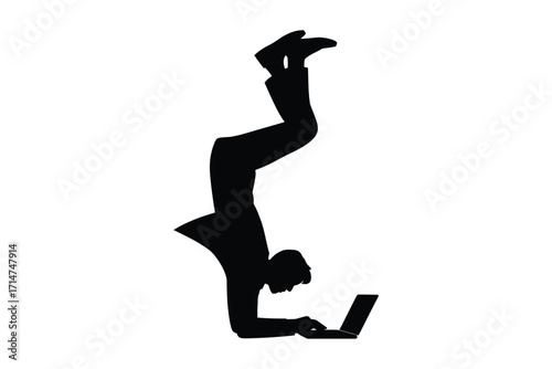 Silhouette of a businessman doing a handstand while using a laptop computer