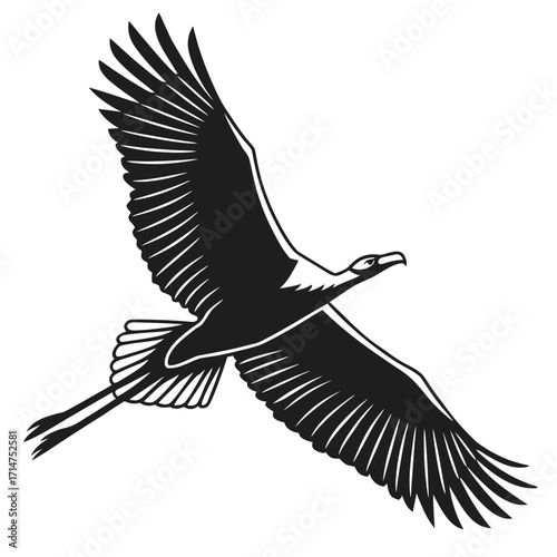 Majestic black silhouette of a large bird of prey with outstretched wings soaring gracefully against a white background