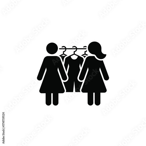 Two female figures standing next to a clothes rack with hanging garments