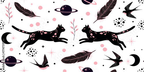 Magical seamless pattern with celestial cats, planets, swallows, and feathers in a whimsical cosmic design