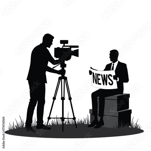 Cameraman films man reading newspaper on boxes outdoors