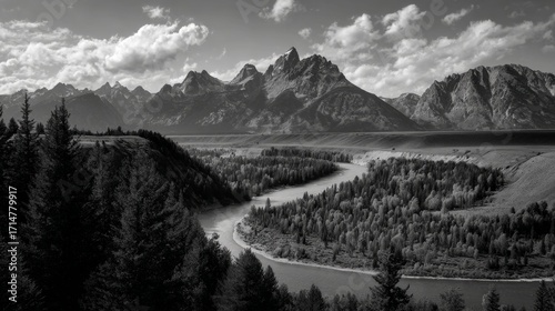 the stunning view of the grand teton mountain range, with the snake river running through it in the foreground