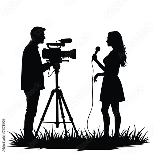 Silhouette of a male videographer filming a female reporter with microphone