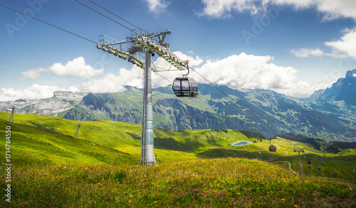 Grindelwald–Maennlichen gondola cableway in Swiss Alps in the canton of Bern