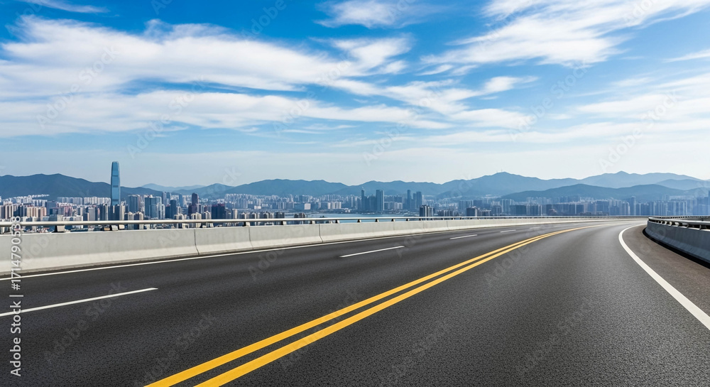 Fototapeta premium Curved Highway Leading to Modern City Skyline with Mountain Backdrop