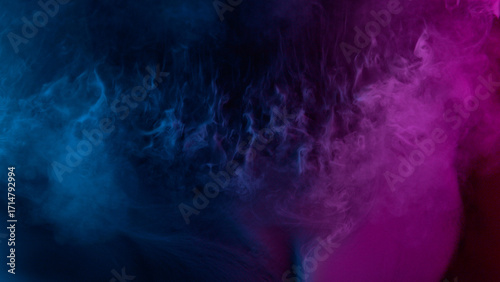 Atmospheric smoke, abstract neon color background, close-up.