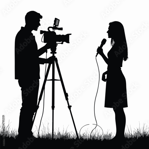 Silhouette of man filming woman with microphone outdoors