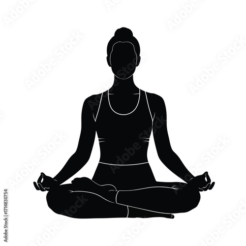 Woman meditating in lotus position a striking black and white silhouette