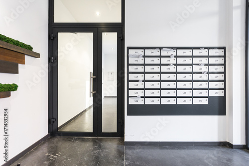 mailboxes in the lobby of an apartment building