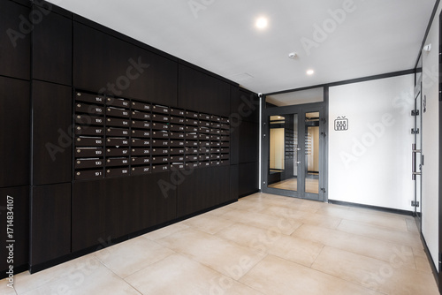 mailboxes in the lobby of an apartment building