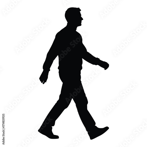 A man walking forward in a stark black silhouette