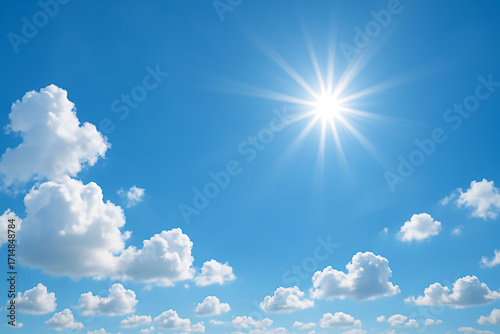 Bright sunny day with fluffy white clouds in clear blue sky
