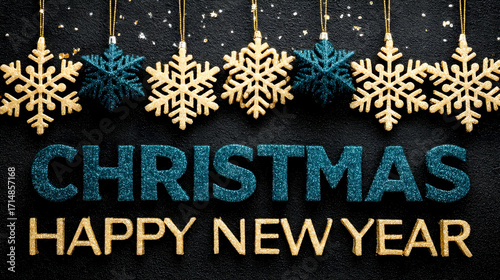 Glittering gold and blue snowflakes hang above the inscription 'Christmas Happy New Year' on a black textured background.