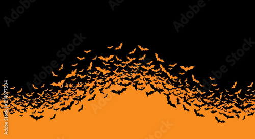 Swarm of Bats Silhouette Against an Orange Sky Halloween Night Concept.