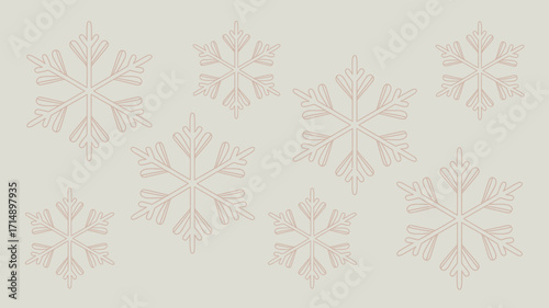 A collection of translucent snowflakes scattered on a plain background creating a wintery scene view