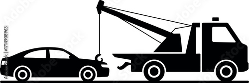 Tow truck assisting a broken down car with its crane system