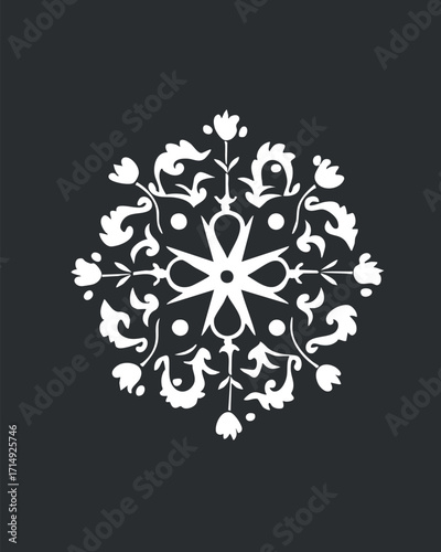 A beautiful white snowflake design featuring intricate floral patterns on a dark background.