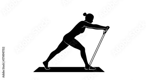 Silhouette woman exercising with resistance band on mat in gym pose